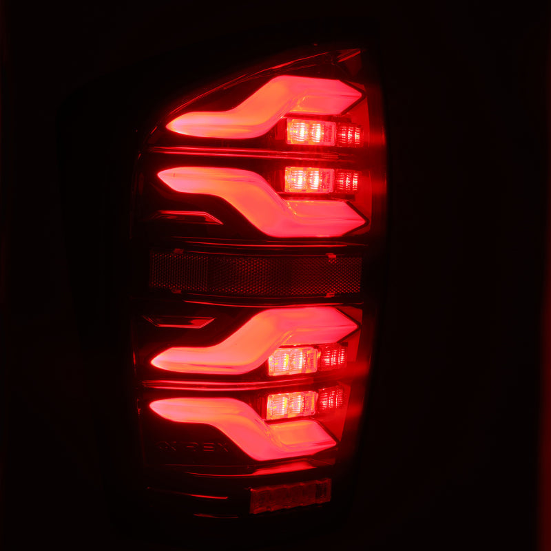 AlphaRex 16-21 Toyota Tacoma LUXX LED Taillights Blk/Red w/Activ Light/Seq Signal 680000 *Discontinued
