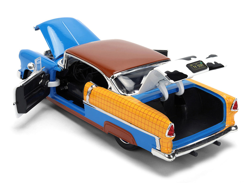 1955 Chevrolet Bel Air Blue with Graphics and Woody Diecast Figure "Toy Story" Franchise "Hollywood Rides" Series 1/24 Diecast Model Car by Jada