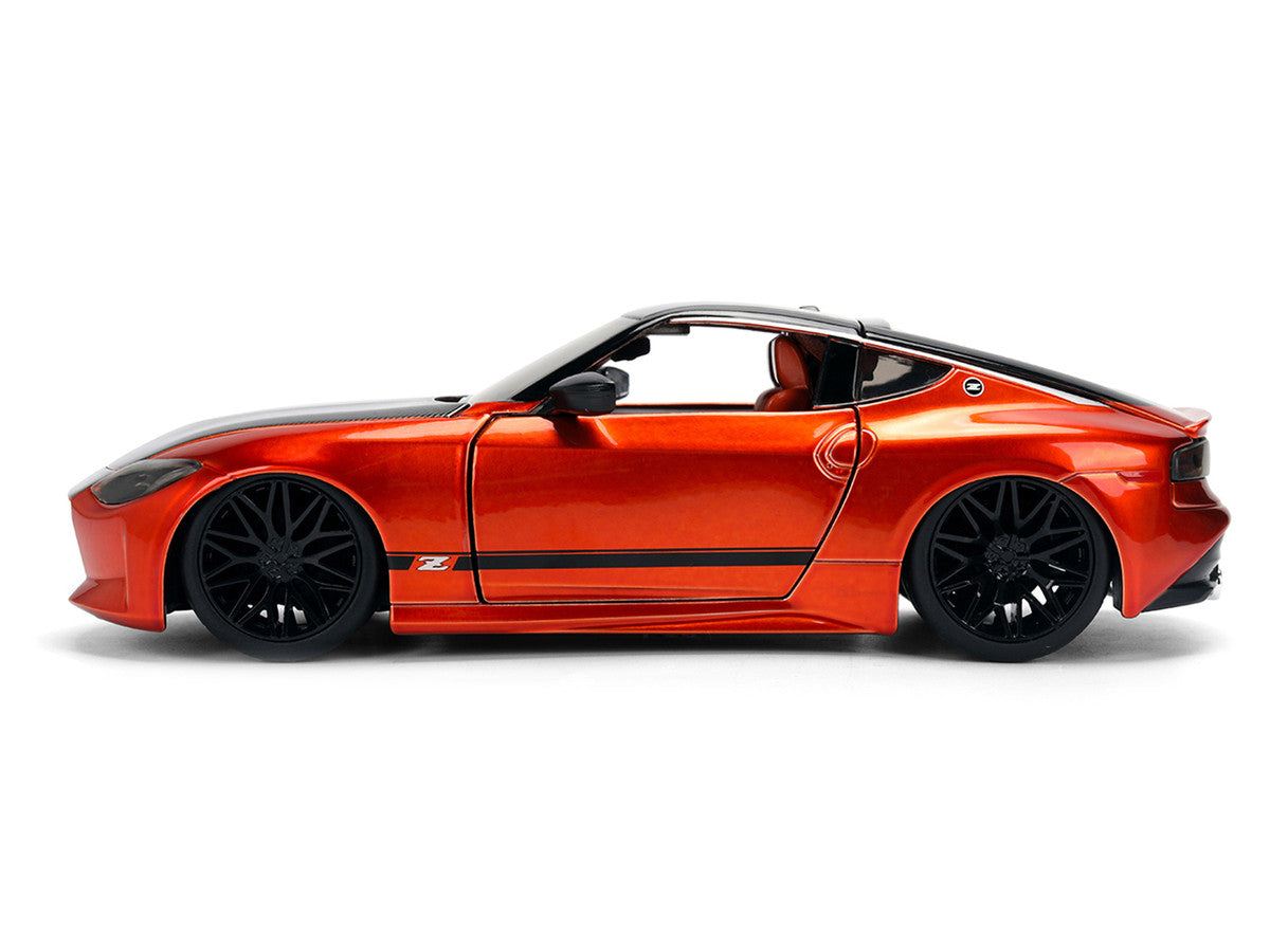 2023 Nissan Z Orange Metallic with Carbon Hood and Black Top "JDM Tuners" Series 1/24 Diecast Model Car by Jada