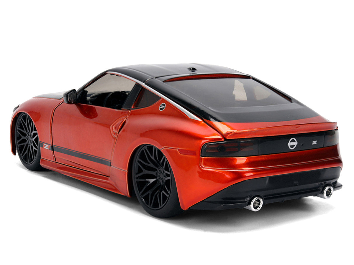2023 Nissan Z Orange Metallic with Carbon Hood and Black Top "JDM Tuners" Series 1/24 Diecast Model Car by Jada