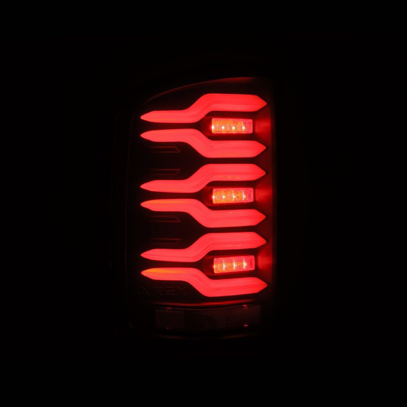 AlphaRex 14-18 GMC Sierra 1500/2500HD/3500HD LUXX-Series LED Tail Lights Blk w/Actv Light & Seq. Sig 630040 *Discontinued