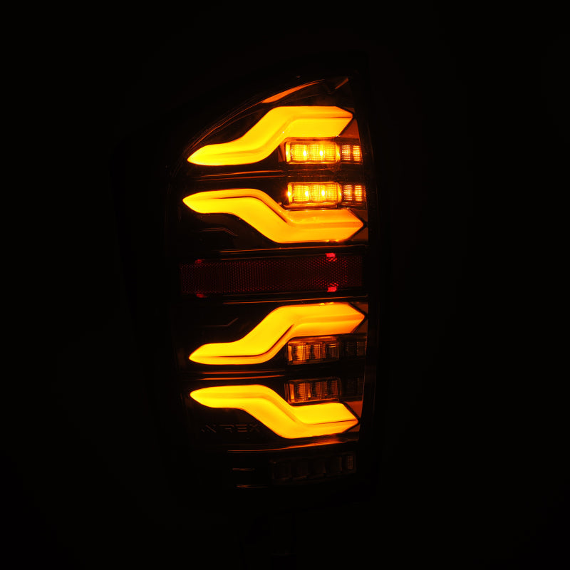 AlphaRex 16-21 Toyota Tacoma LUXX LED Taillights Alpha Blk w/Activ Light/Seq Signal 680080 *Discontinued