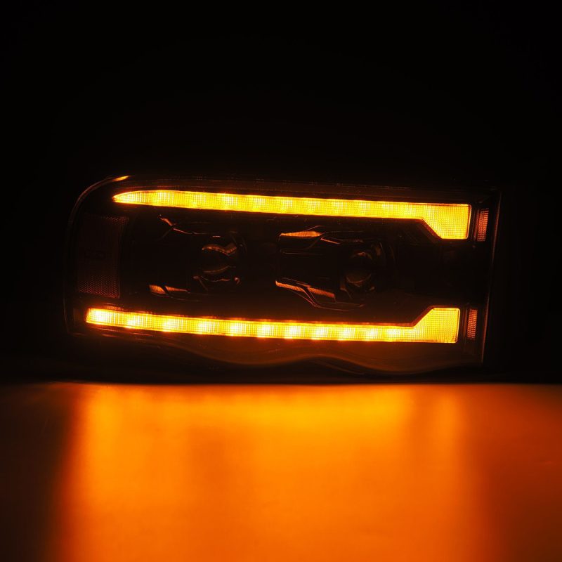 AlphaRex 02-05 Dodge Ram 1500 PRO-Series Projector Headlights Plank Style Alpha Black w/Seq Signal 880572 *Discontinued