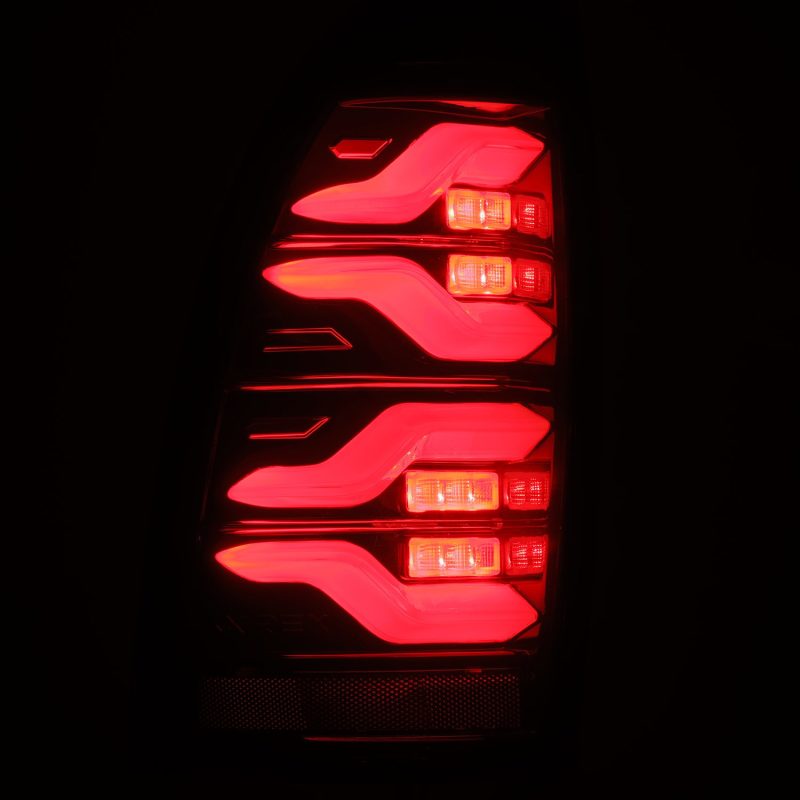 AlphaRex 05-15 Toyota Tacoma LUXX LED Taillights Blk/Red w/Activ Light/Seq Signal 680070 *Discontinued