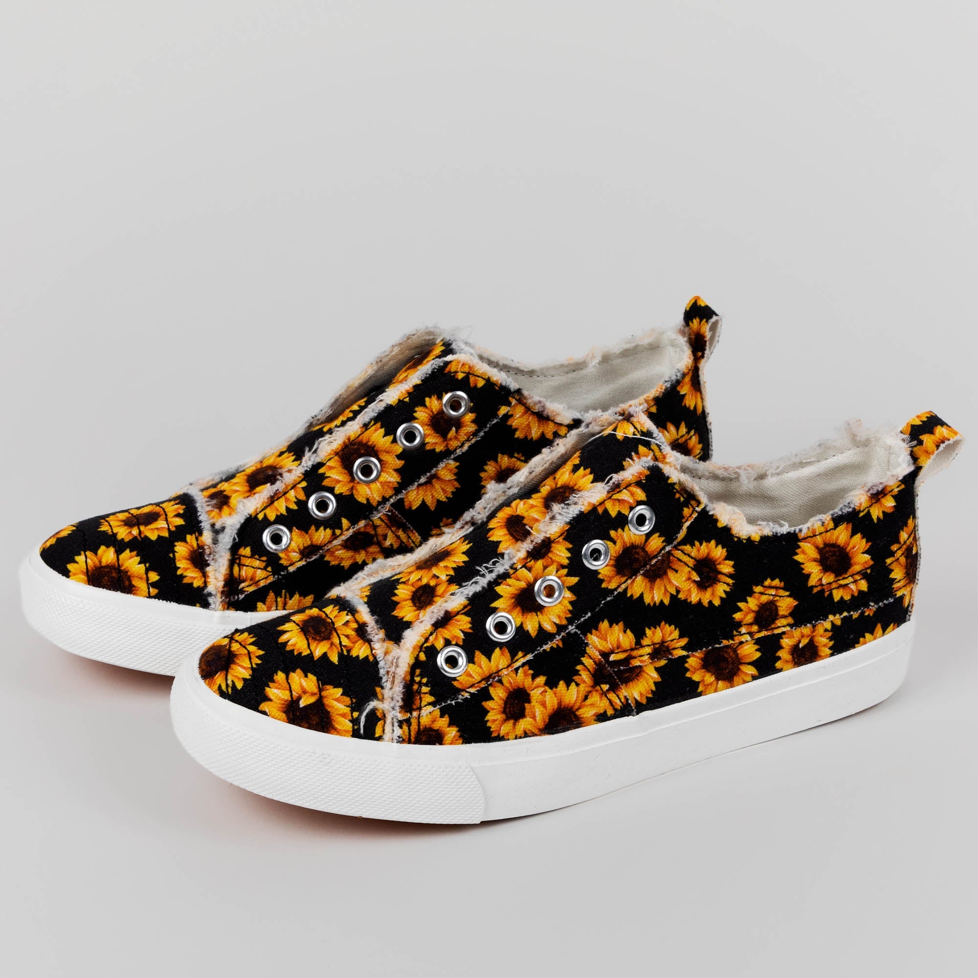 Girlie Girl Canvas Slip-On Sneakers by GreaterGood - Distressed Detail