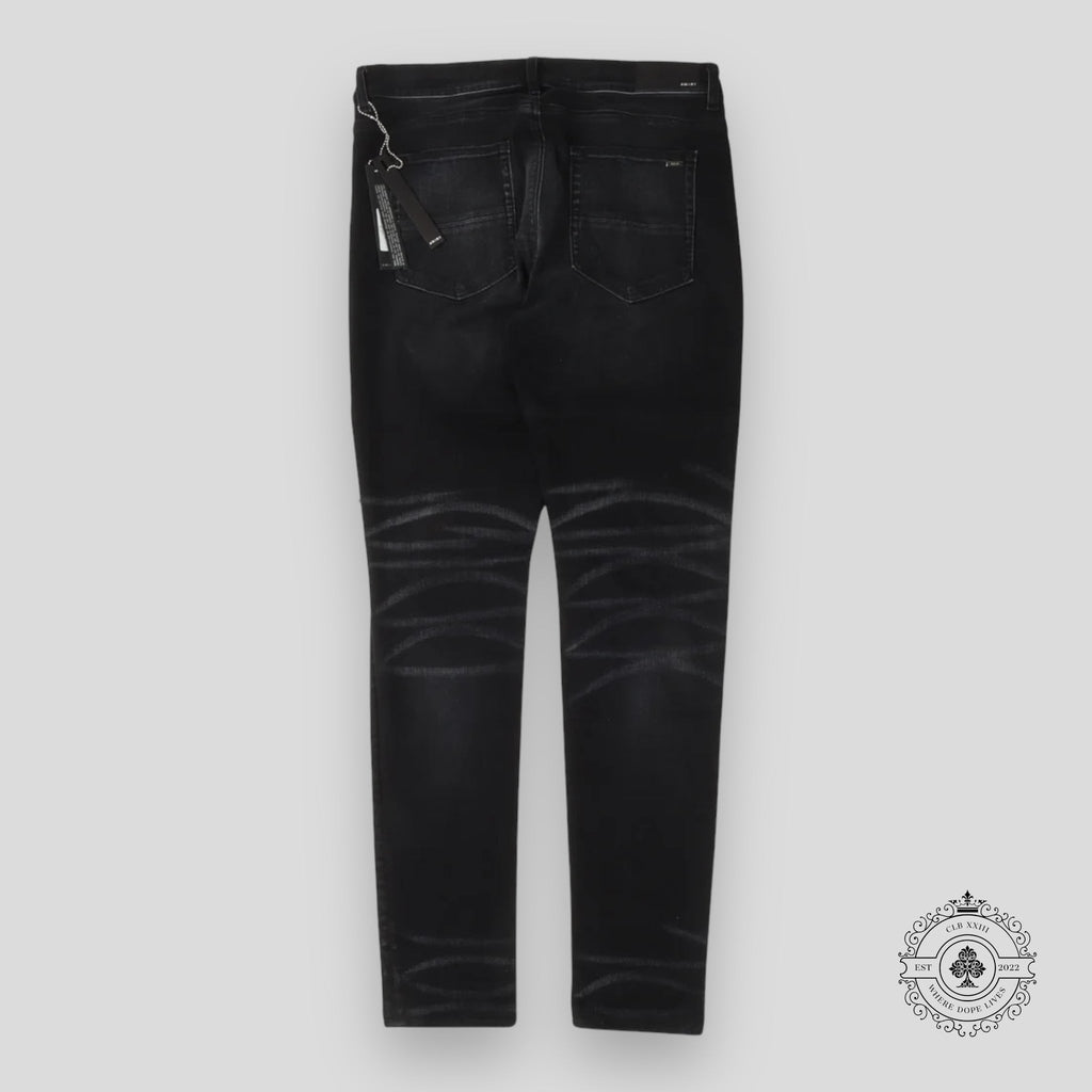 Amiri Leopard Patch Thrasher Jeans in Black