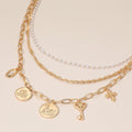 Flower Swan Embossed Medallion Key Cross Pearl Charm Station Layered Chain Necklace