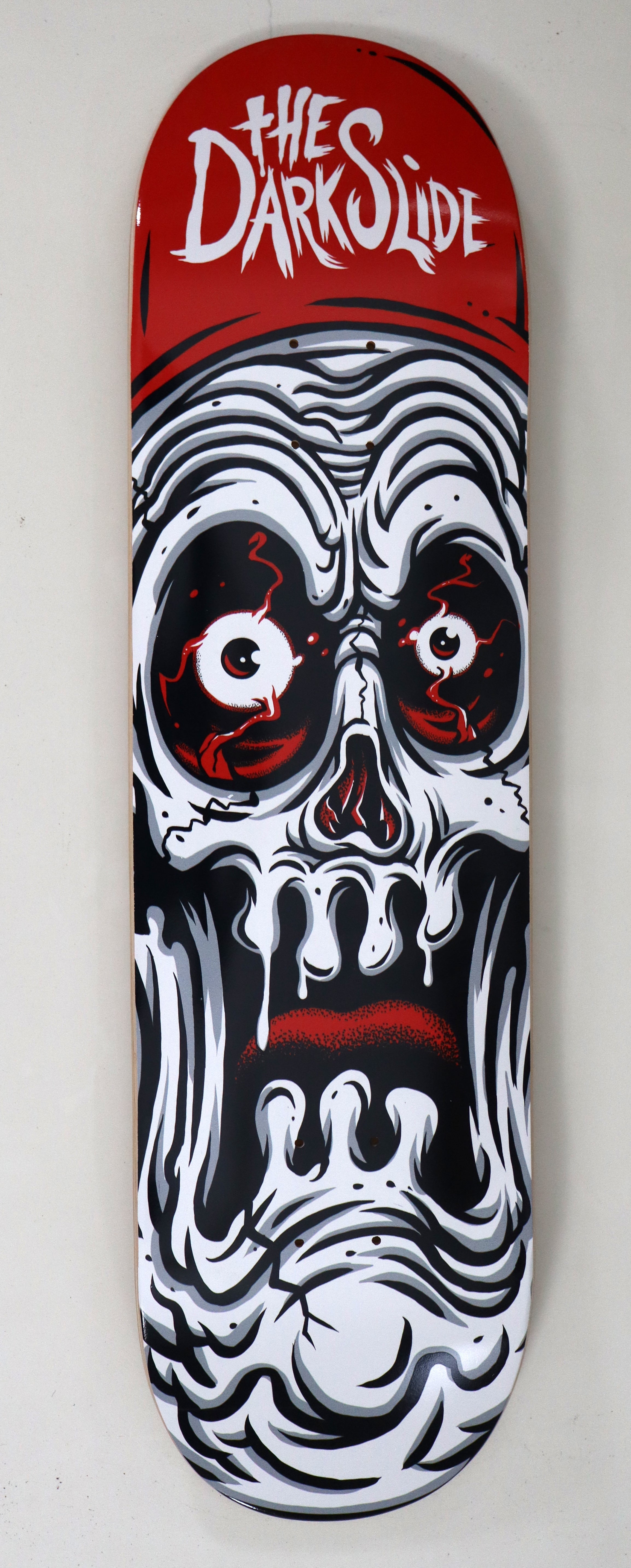 The Dark Slide x Tim Baron "Ghoul Skull" 8.25" Complete Skateboard