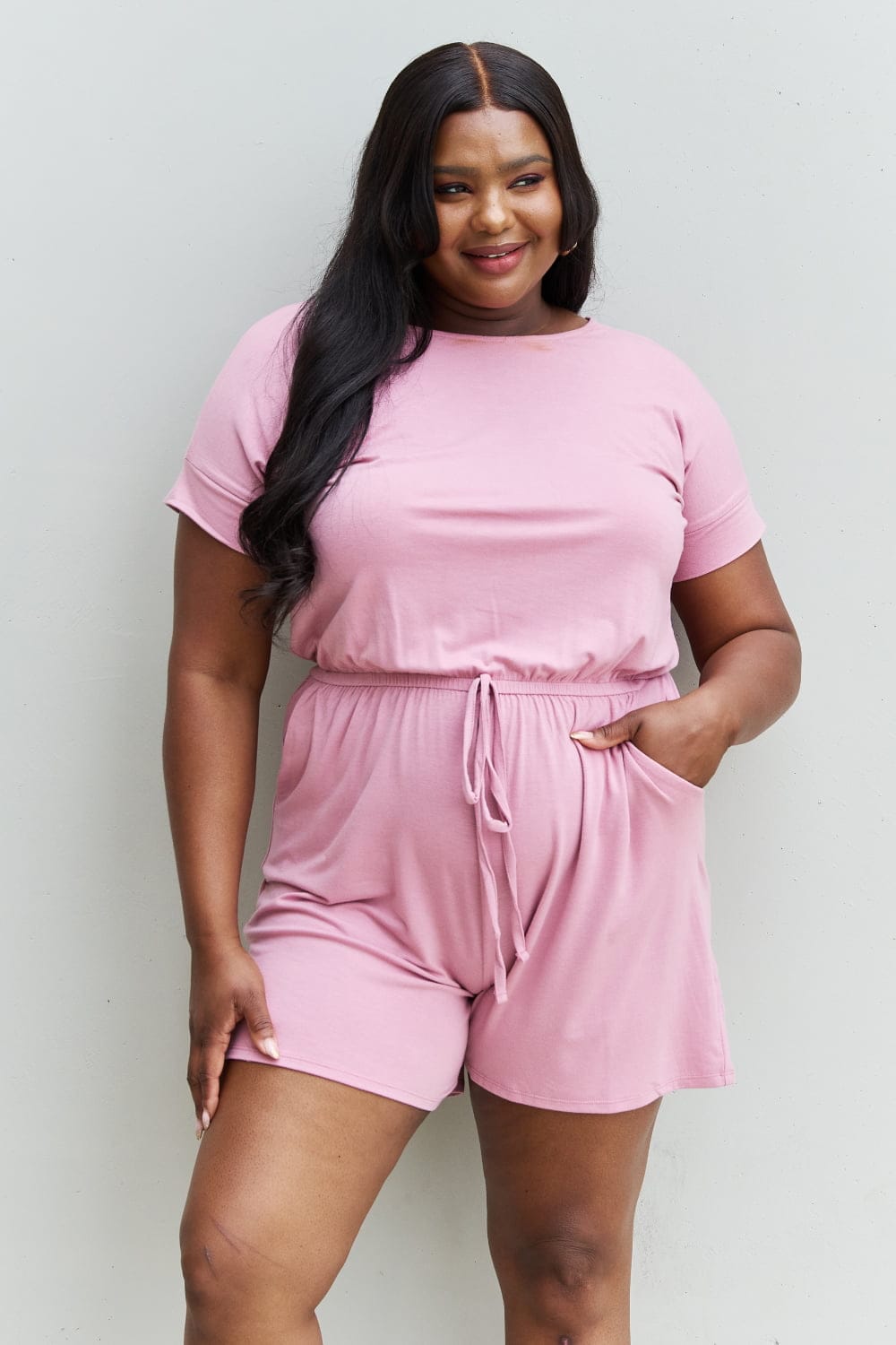 Pink Full Size Short Sleeve Romper in Light Carnation.