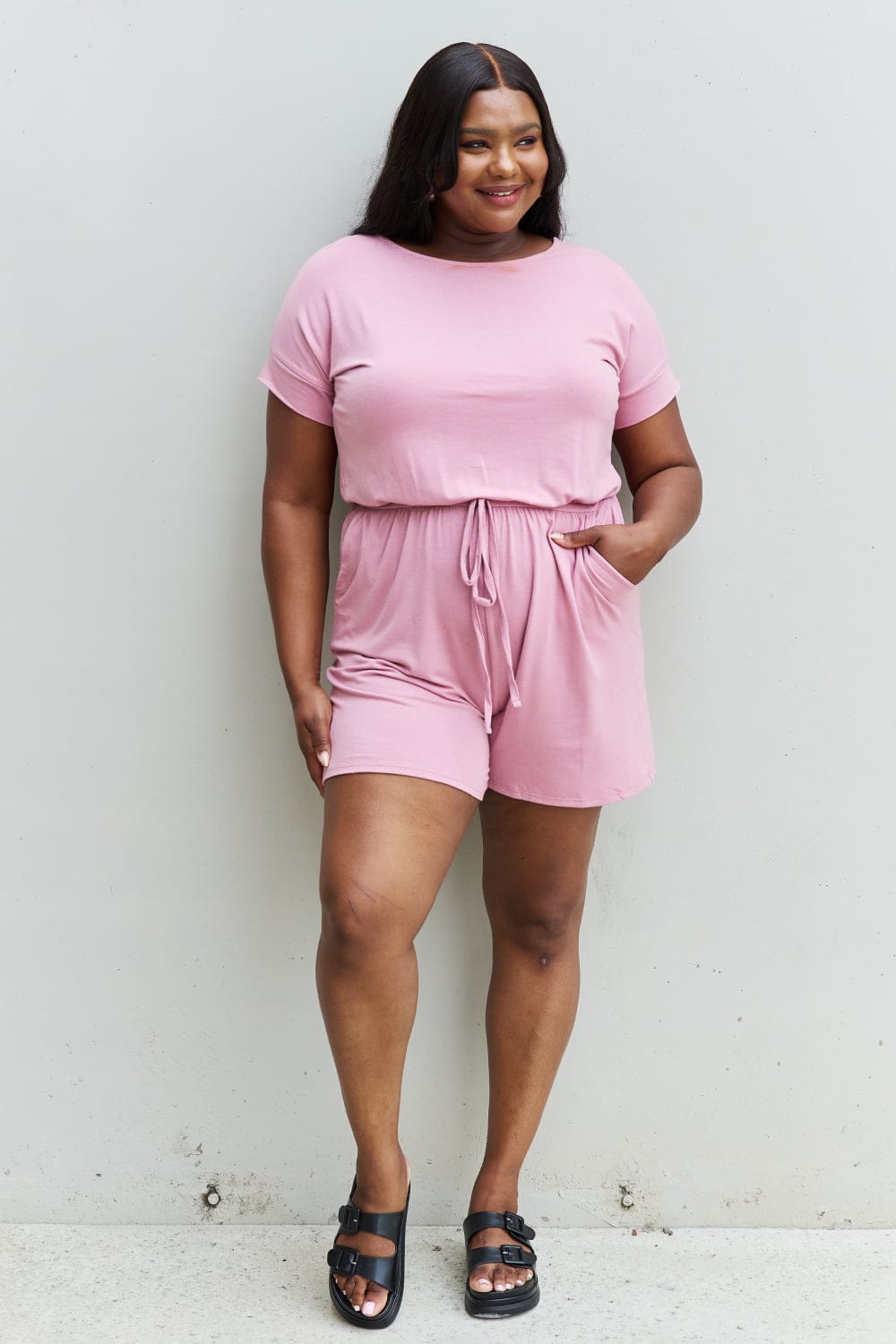 Pink Full Size Short Sleeve Romper in Light Carnation.