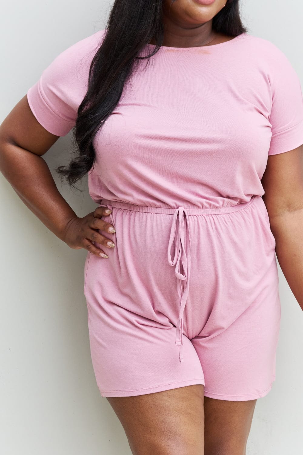 Pink Full Size Short Sleeve Romper in Light Carnation.