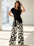 Women's plus Size Two-Piece Set Lazy Style Black Side Twisted T-Shirt And Black White Leaf Print Wide Leg Pants Casual Outfit