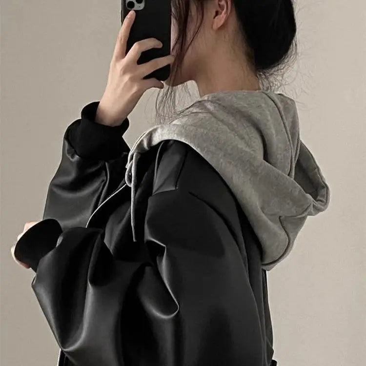 Korean High-end Black PU Leather Jacket Women Fashion Hooded Loose Spring Autumn Zipper Fake Two-Piece Versatile Outerwear