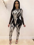 See through Sequin Long Sleeve Jumpsuit.