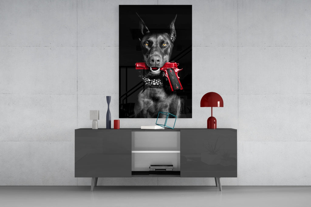 Doberman Holding Red Pistol Glass Wall Art