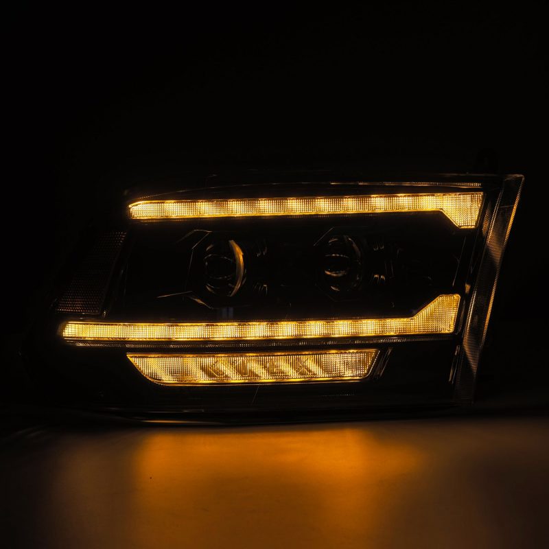 AlphaRex 09-18 Ram 2500 LUXX LED Proj Headlight Plank Style Alpha Blk w/Activ Light/Seq Signal/DRL 880560 *Discontinued